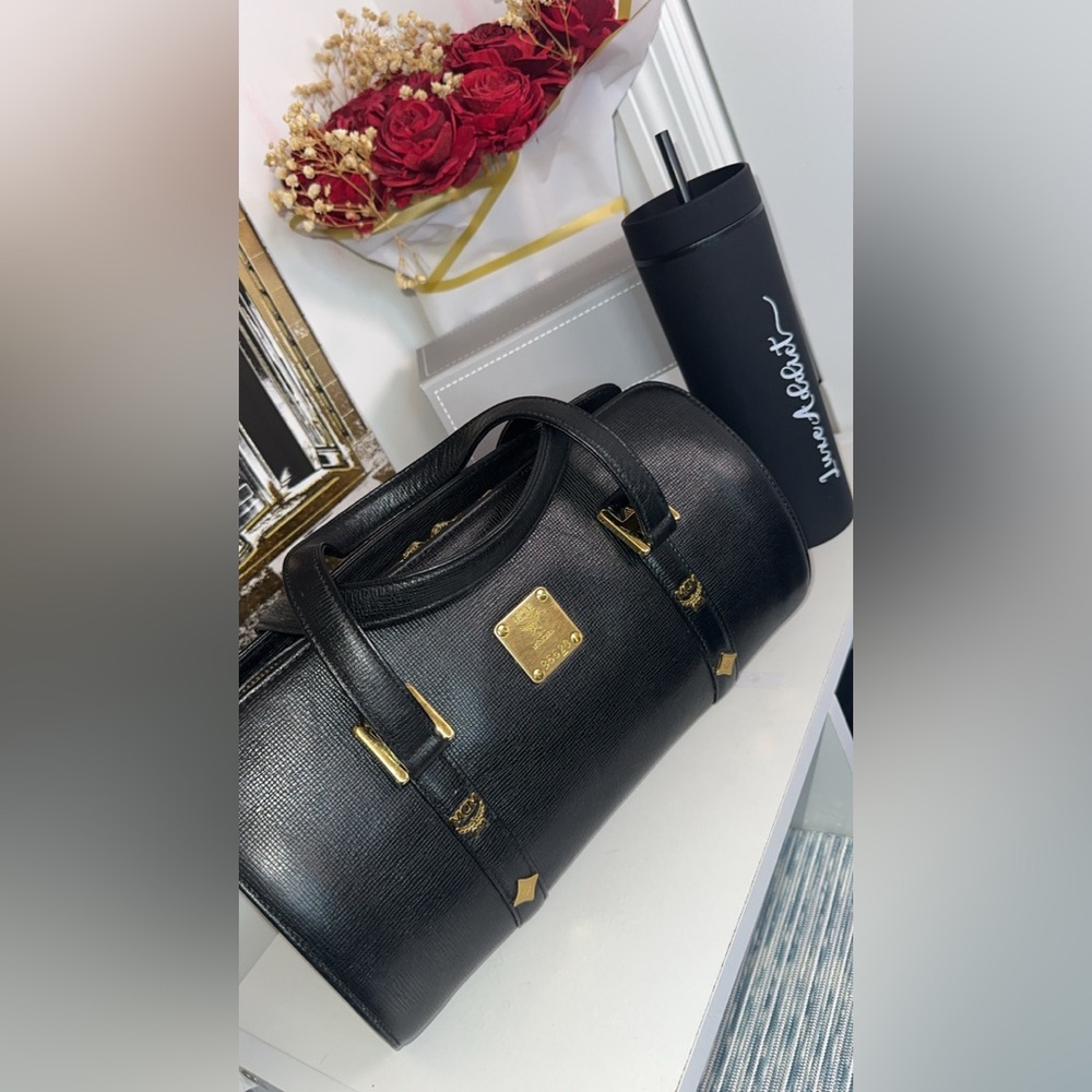 MCM Black Satchel papillon studded with Gold Hardware